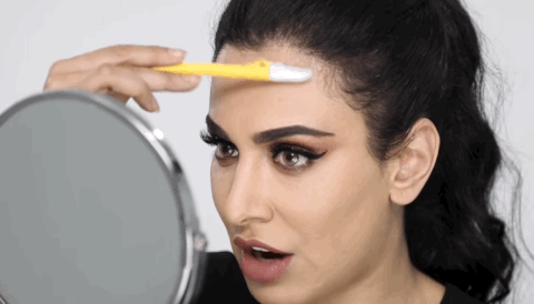 girl shaving face