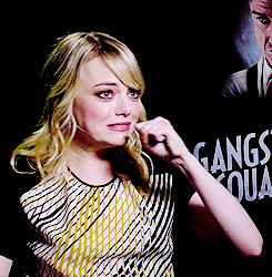 emma stone laughing GIF