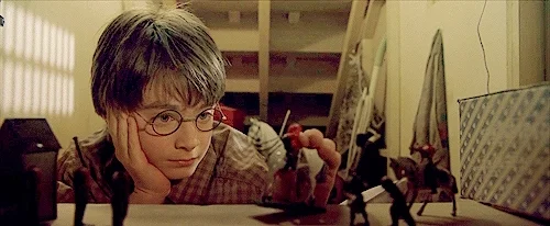 bored harry potter GIF