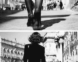 black and white walking GIF