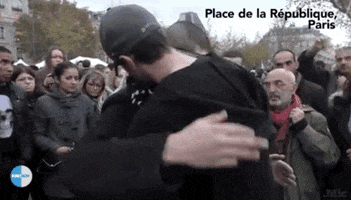 paris attacks hug GIF