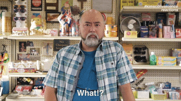 TV gif. Actor Paul Sun-Hyung Lee as Appa in Kim's Convenience exclaims in confused shock. Text, "What?!"