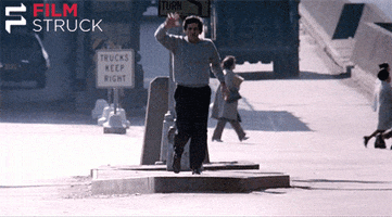 waving the exorcist GIF by FilmStruck