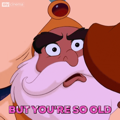 Disney gif. Close-up on face of Sultan from Aladdin exclaiming, "but you're so old."