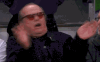 Movie gif. Wearing tinted sunglasses and a dark shirt, Jack Nicholson waves frantically in an X shape as if to say I don't want anything to do with this! 