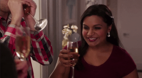 happy the mindy project GIF