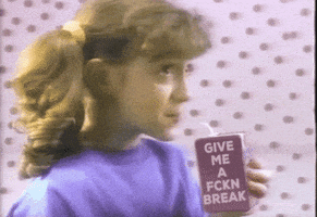 Video gif. Young girl in a bright purple t-shirt sips from a purple juicebox, which is labeled, "Give me a FCKN break." When she makes eye contact with us, she feigns shock before smiling slyly and showing off the juicebox. The background is light pink with purple polka dots, making the video appear vintage.