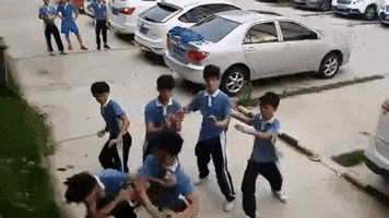 carfuffle fight school kids GIF