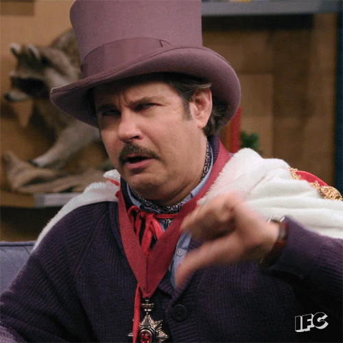 TV gif. Paul F. Tompkins in Comedy Bang Bang. He wears a top hat and cape and rolls his eyes up while giving a fat thumbs down.
