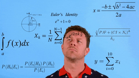 a man is standing in front of a blue board with math equations on it