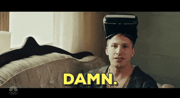 SNL gif. Andy Samberg is wearing a virtual reality headset on top of his head. He looks to us and says, "Damn."