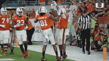 jumping college football GIF by Miami Hurricanes