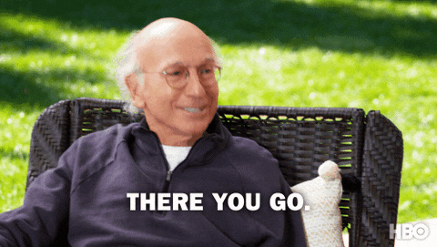 Gif of Larry David sitting in a chair in a garden saying: There you go, now you're talking. 