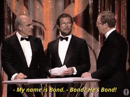 roger moore oscars GIF by The Academy Awards
