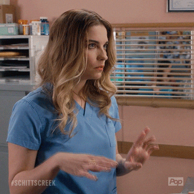 Schitt's Creek gif. Annie Murphy as Alexis quickly says, “sorry” and studies the person off screen’s face, then grimaces as if knowing she has said something she shouldn't have. 