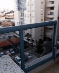 Ashkelon Resident Ducks Inside as Missile Strikes Outside Apartment