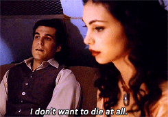 Video gif. With fear in her eyes, Morena Baccarin as Inara on Firefly says, “I don't want to die at all.”