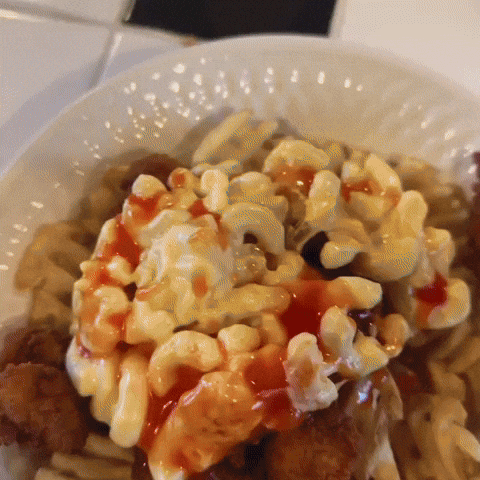 Black Lab Licking Sauce GIF