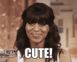 TV gif. Kerry Washington beams and presses her hands to her mouth on the talk show, Katie. Text reads, "Cute!"