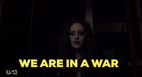 Mr. Robot tv show actress mouthing "We are in a war" gif, image text reads "We are in a war" in all capital letters