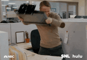 SNL gif. In an office cubicle, an angry Martin Freeman throws his computer monitor to the floor.