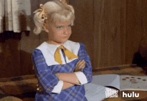 TV gif. Susan Olsen as Cindy in The Brady Bunch crosses her arms and shakes her head in disapproval.