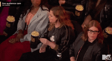 amy poehler popcorn GIF by MTV Movie & TV Awards