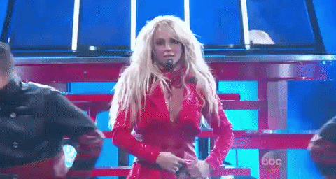 Stripping Britney Spears GIF by Billboard Music Awards - Find & Share on GIPHY