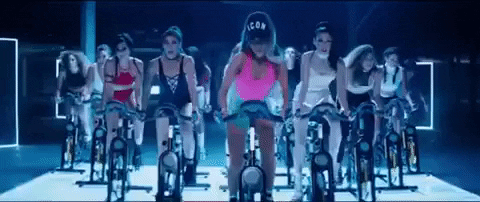  ariana grande exercising side to side mv side to side music video exercise bike GIF