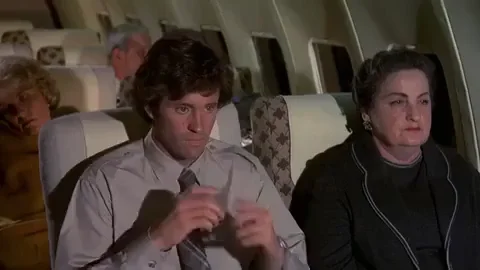 airplane movie drinking water fail GIF