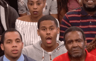 Reality TV gif. The audience at the Maury show is in utter shock and they all sit very still with their jaws dropped open.