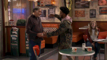 superior donuts hug GIF by CBS