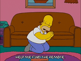 The Simpsons gif. Homer is kneeling and praying in front of his couch and says, "Help me find the remote."