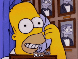 The Simpsons gif. Smiling and wide-eyed Homer holds a telephone to his ear and says, “Yeah.”