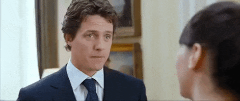 looking around love actually GIF