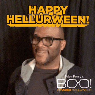 Celebrity gif. Tyler Perry smiles and waves before giving us a thumbs up. Text, "Happy Hellurween!"
