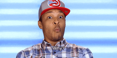 Reality TV gif. T.I. on T.I. and Tiny the Family Hustle with wide eyes as he yells, “Why?”
