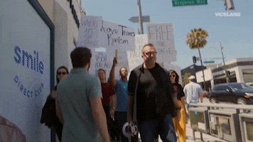 tom arnold protest GIF by THE HUNT FOR THE TRUMP TAPES