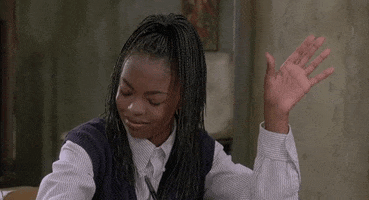 Movie gif. Lauryn Hill as Rita Louise Watson in Sister Act 2. She closes her eyes and tilts her head down, letting out a small whistle. She raises her hand and waves it all around in praise.