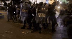 police crowd GIF