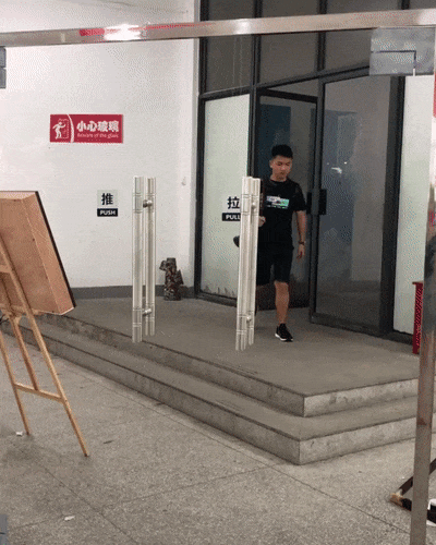 prank fake glass doors GIF
