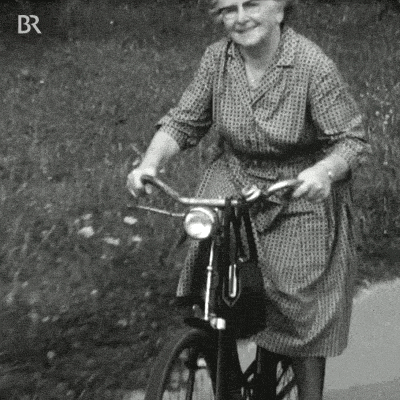 old lady on bike