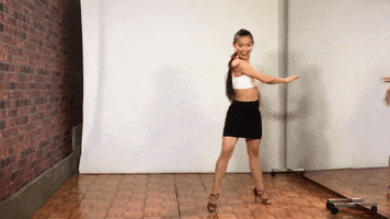 dancing girl spins GIF