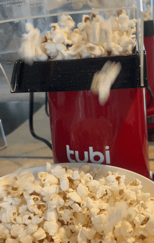 Pop Popcorn GIF by Tubi - Find & Share on GIPHY