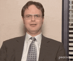 The Office gif. Rainn Wilson as Dwight Schrute, in a confessional, breaks down crying, bringing his hand to cover his eyes.