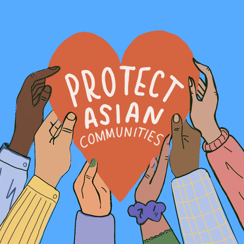 Digital art gif. Six cartoon hands of different races hold up an orange heart shape, text inside of which reads, "Protect Asian Communities," all against a bright blue background.