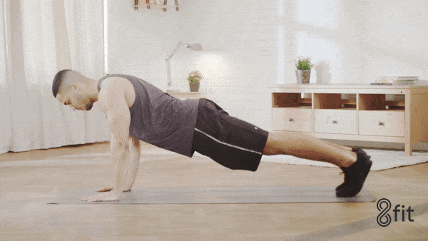 ejercicio dinámico de plancha para fortalecer el core