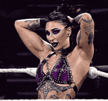 Rhea Ripley Arms Up GIF