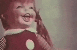 doll laughing GIF