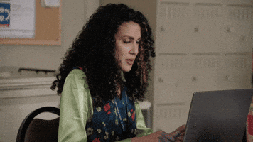 Looks To Camera GIF